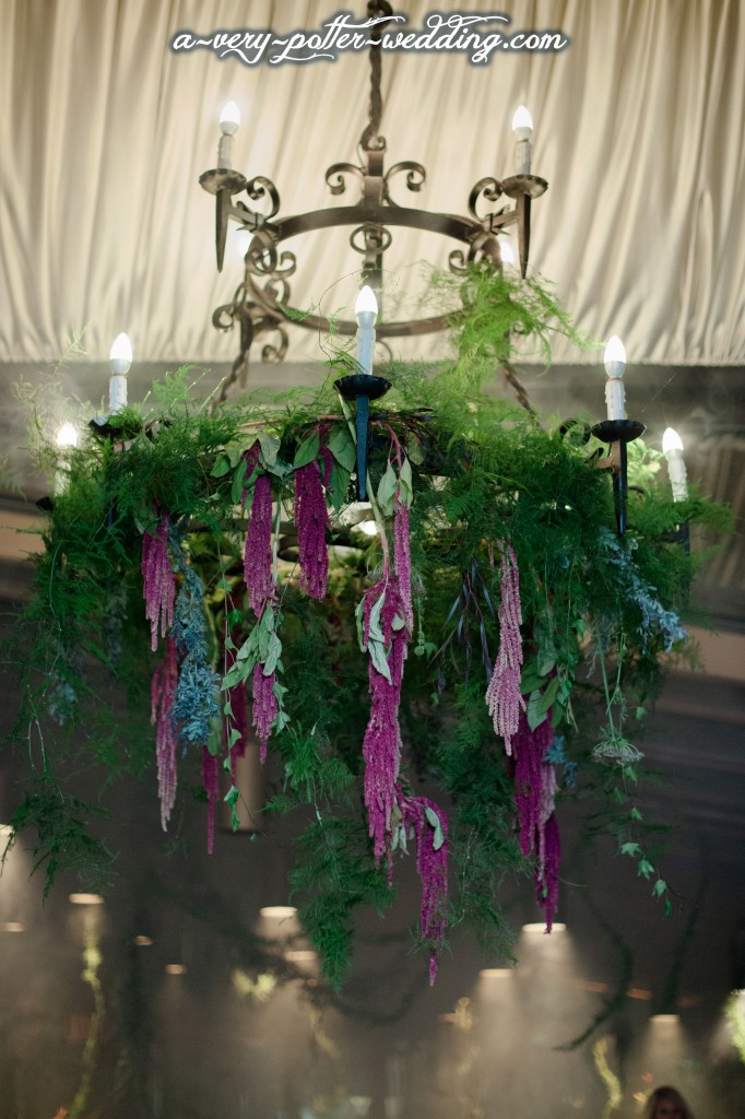 chandalier green plants wedding